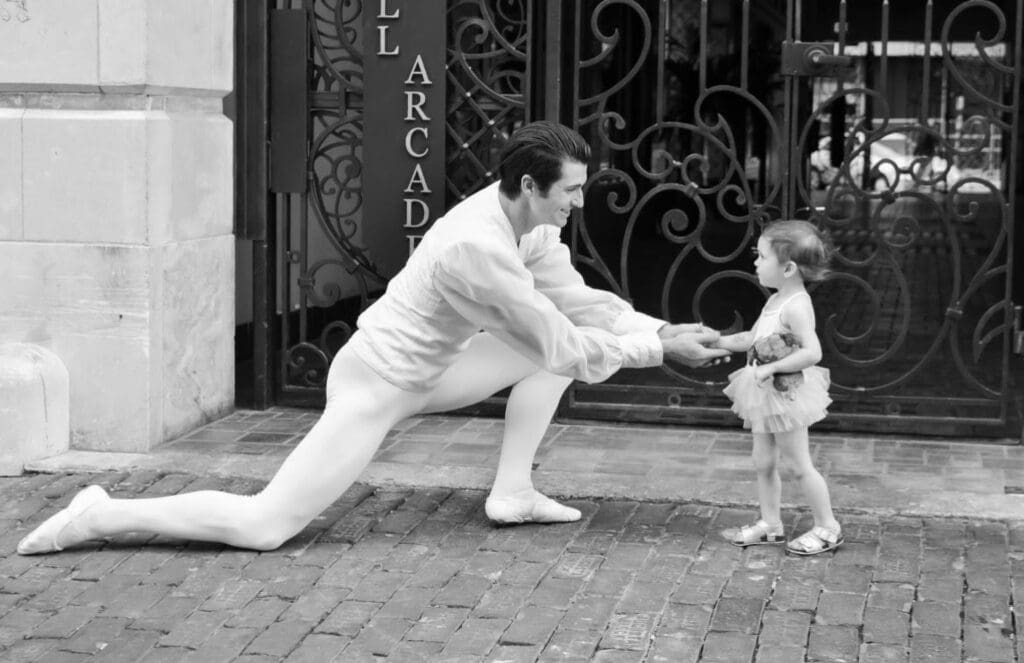 A man and child are playing with each other.