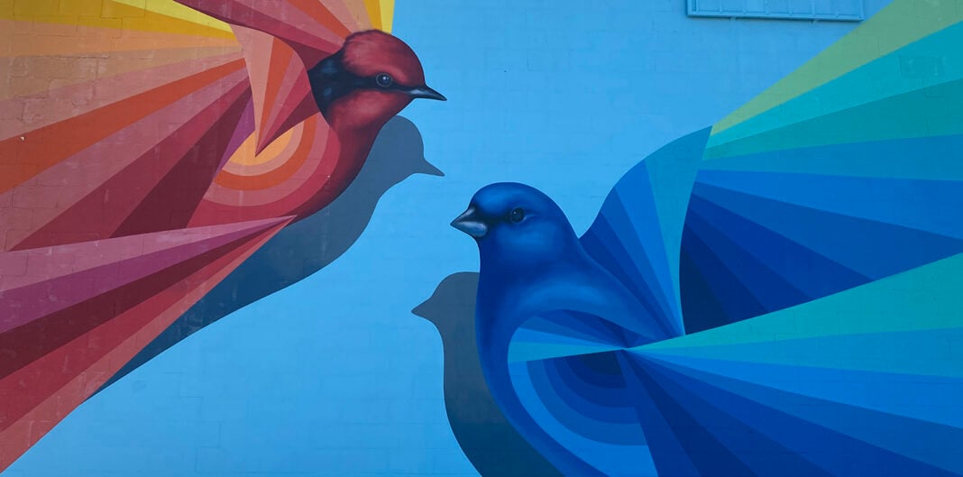 Cecelia Lueza’s mural graces the side of “The Bird’s Nest” live-in studio at the ArtsXchange